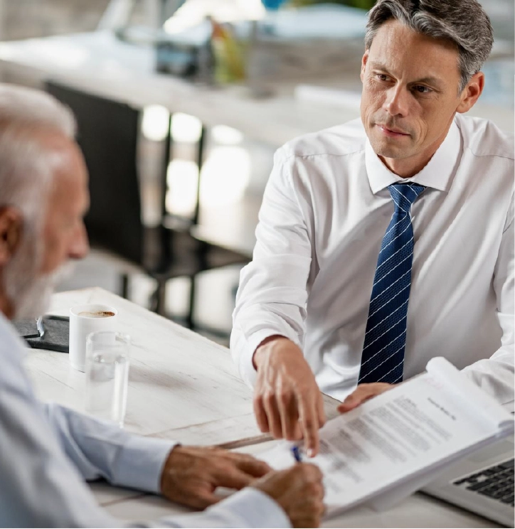 ohio-workers-compensation-lawyer-client-consultation Ohio workers' compensation lawyer meeting with a client to discuss workplace injury benefits and legal options.